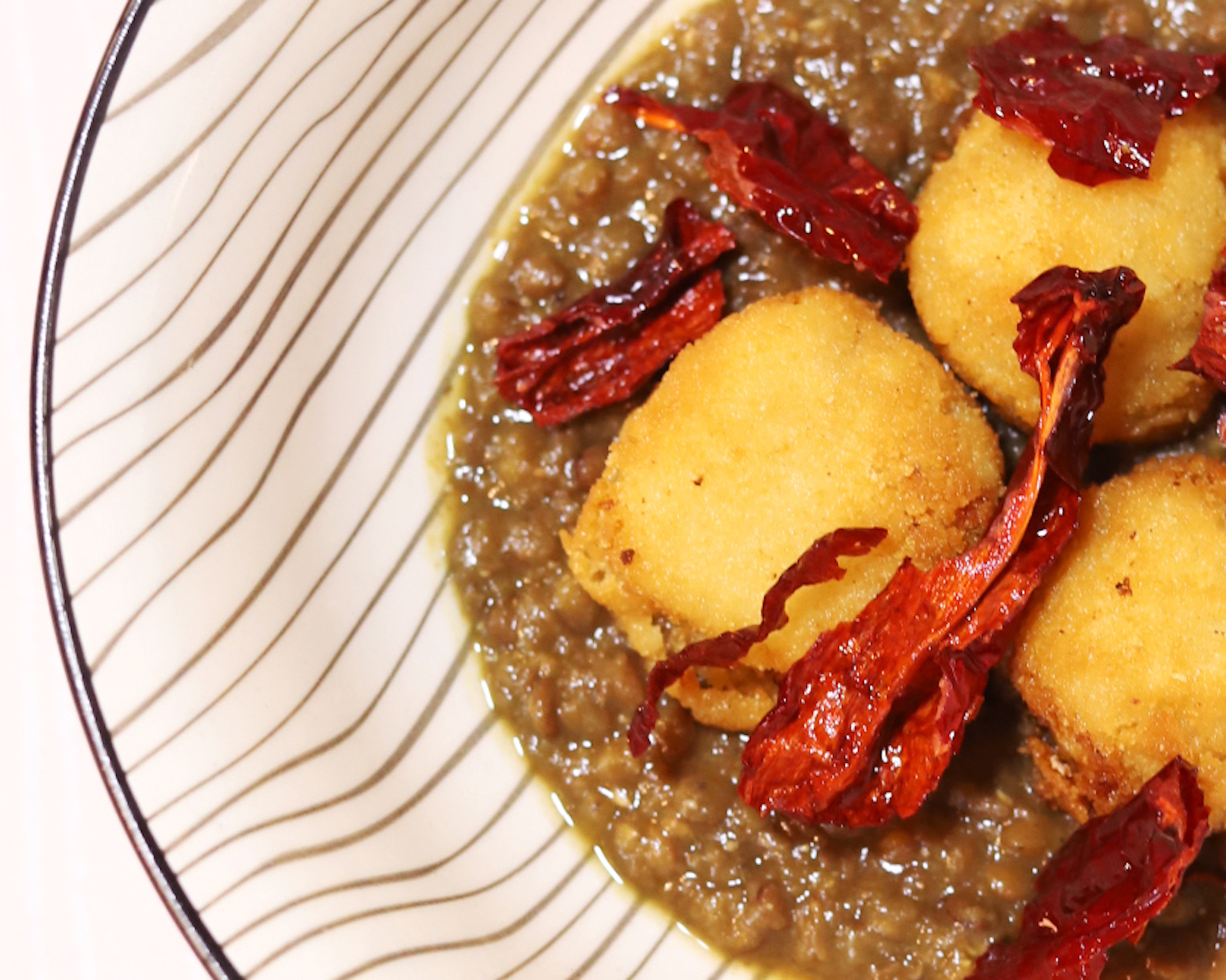 Curry di lenticchie con baccalà mantecato